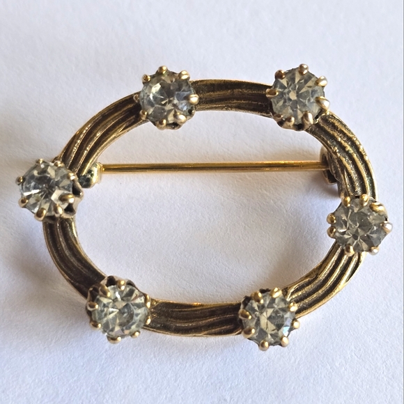 Vintage brooch open oval dark gold tone clear rhinestones - Picture 1 of 7